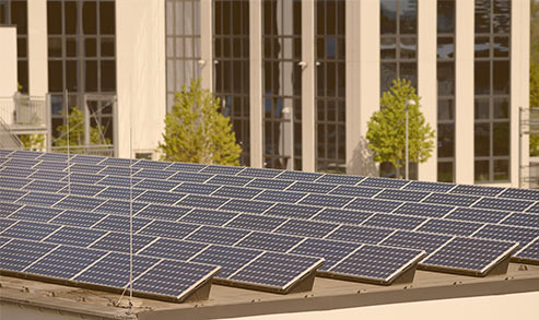 A rooftop covered in solar panels. 
