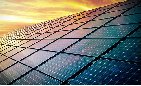 Solar Panels In Front of Sunset
