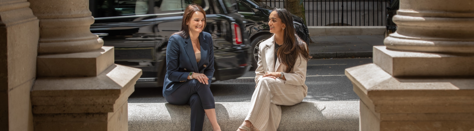 Two employees sitting